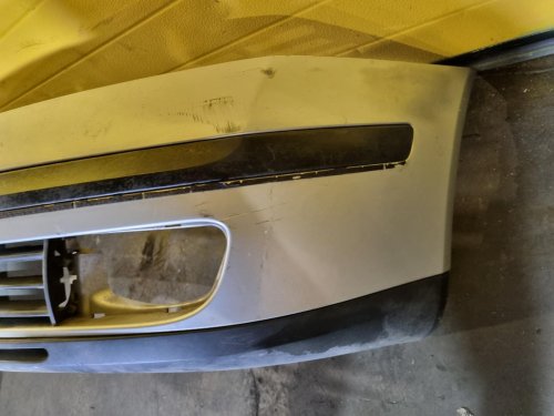 PŘEDNÍ NÁRAZNÍK ŠKODA OCTAVIA II, STŘÍBRNÝ, S OTVORY PRO MLHOVKY - 18709