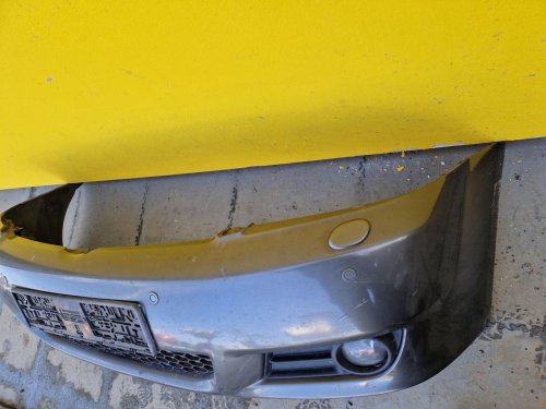 PŘEDNÍ NÁRAZNÍK TOYOTA COROLLA VERSO II, ŠEDÝ, S MLHOVKAMI, SE SENZORY, S OSTŘIKOVAČI - 16641