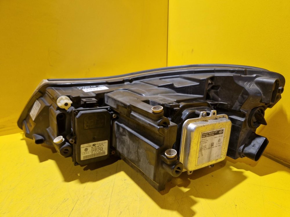 PRAVÉ PŘEDNÍ XENON SVĚTLO ŠKODA OCTAVIA II, FACELIFT - 19375