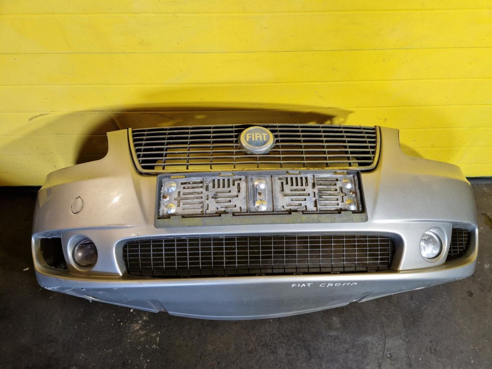 PŘEDNÍ NÁRAZNÍK FIAT CROMA II (194), STŘÍBRNÝ, S MLHOVKAMI - 19104