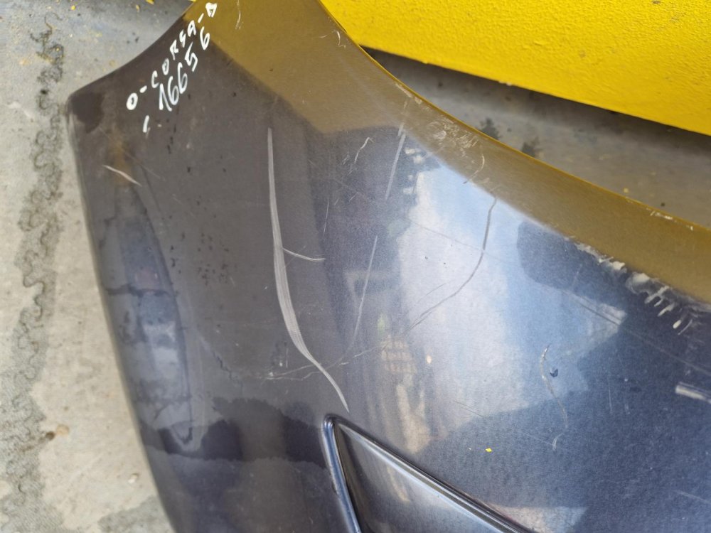 PŘEDNÍ NÁRAZNÍK OPEL CORSA D, ŠEDÝ, S OTVORY PRO MLHOVKY - 16656